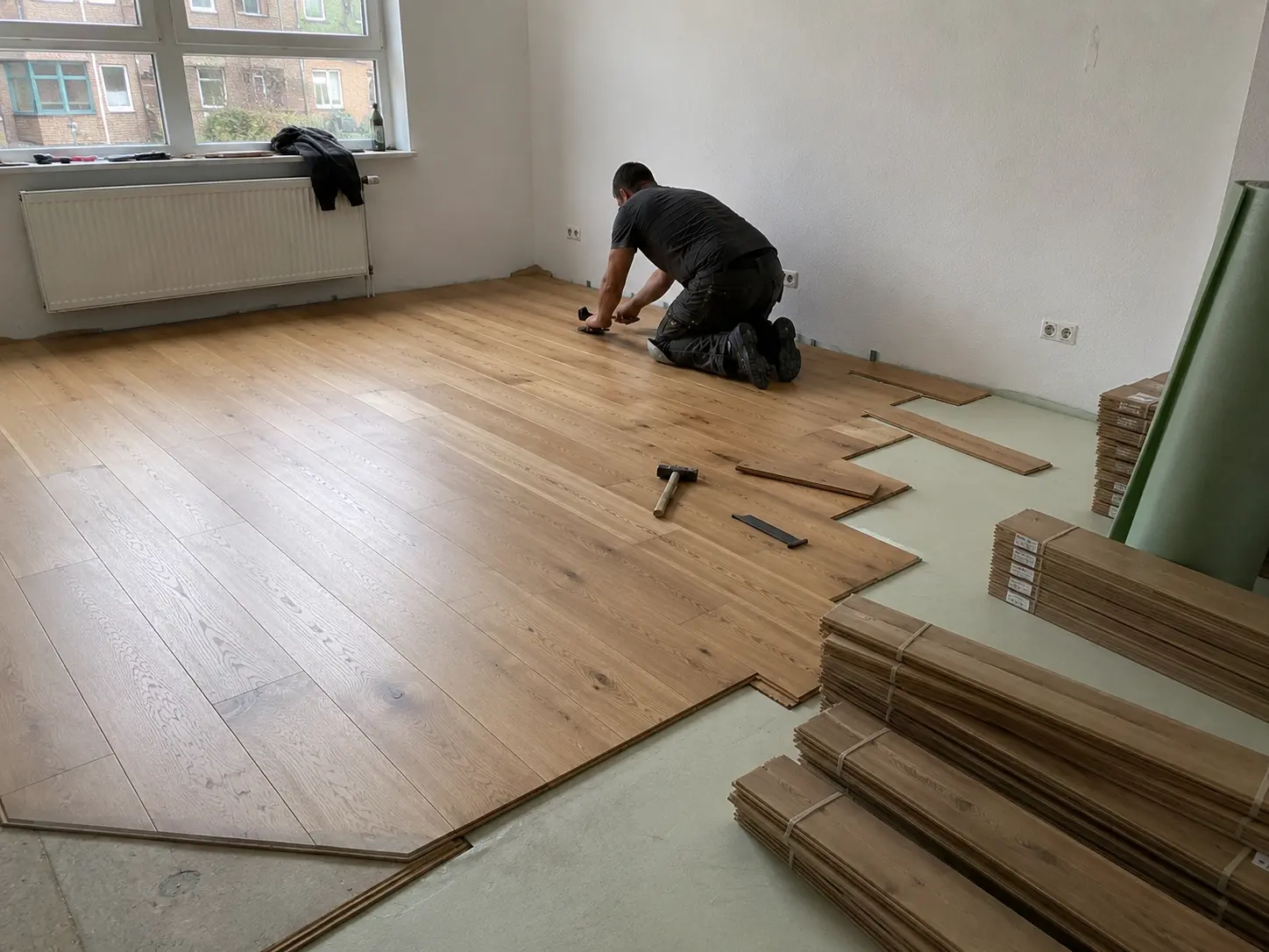 Parkett verlegen im Wohnraum Erfurt durch Malermeister Stelz GmbH